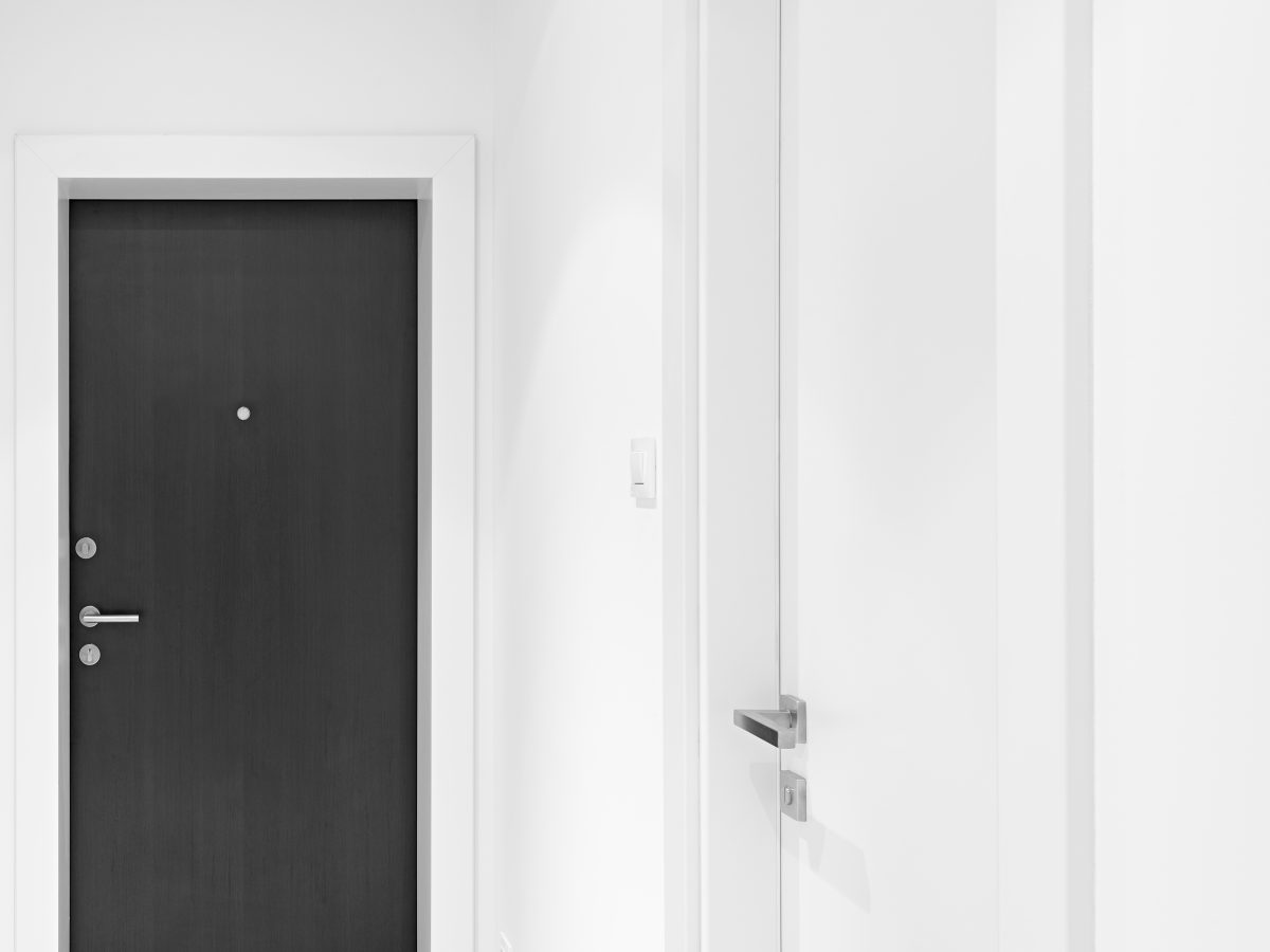 Closed,Metal,Door,In,The,Flat,Corridor.